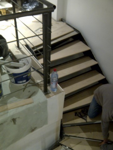 Pose de parquet collé en point de hongrie