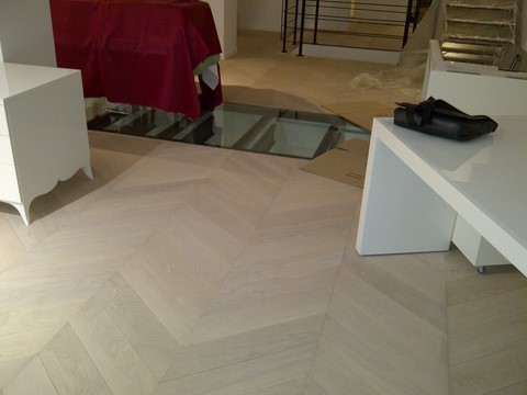 Pose de parquet collé en point de hongrie