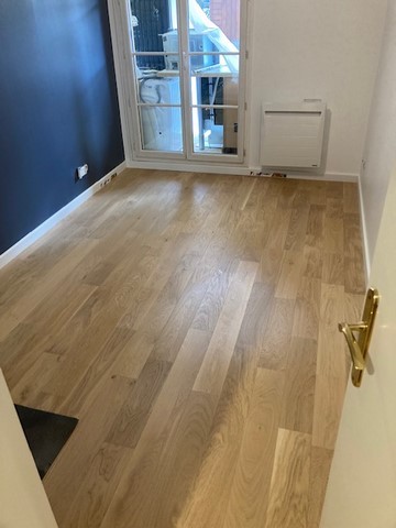Remplacement d'un sol en carrelage par un parquet stratifié